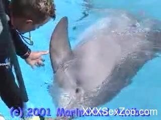 Dolphin porn video with amateur trainer enoying the penis - XXXSexZoo.com