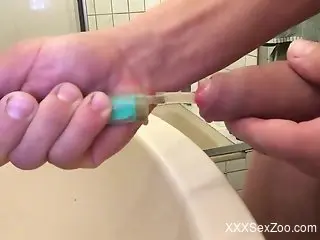 Dude shoves a tapeworm in his urethra while jerking off