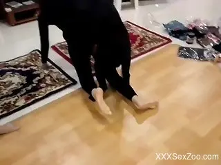 Hot babe in a bodysuit fucks a dog once again