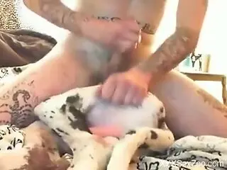Tattooed dude is fucking a horny animal today