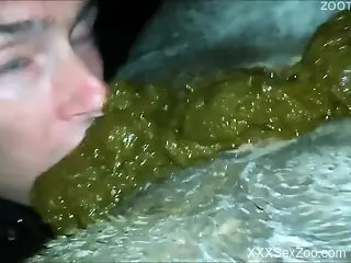 Intrigued man slides fingers in the animal's ass and pussy