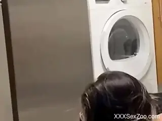 Sexy brunette tries doggy style dog porn in the bathroom